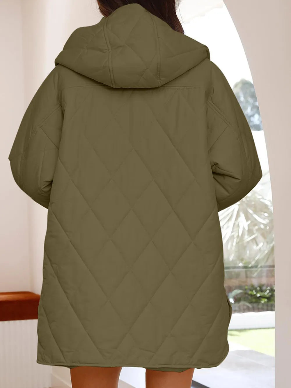 Veste longue fendue à capuche