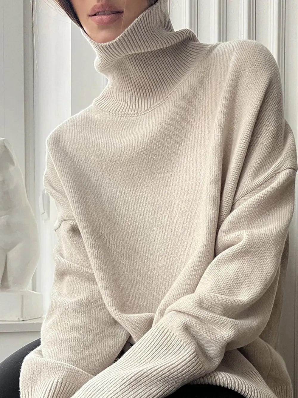 Pull col roulé