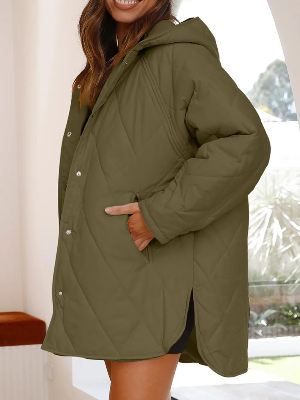 Veste longue fendue à capuche