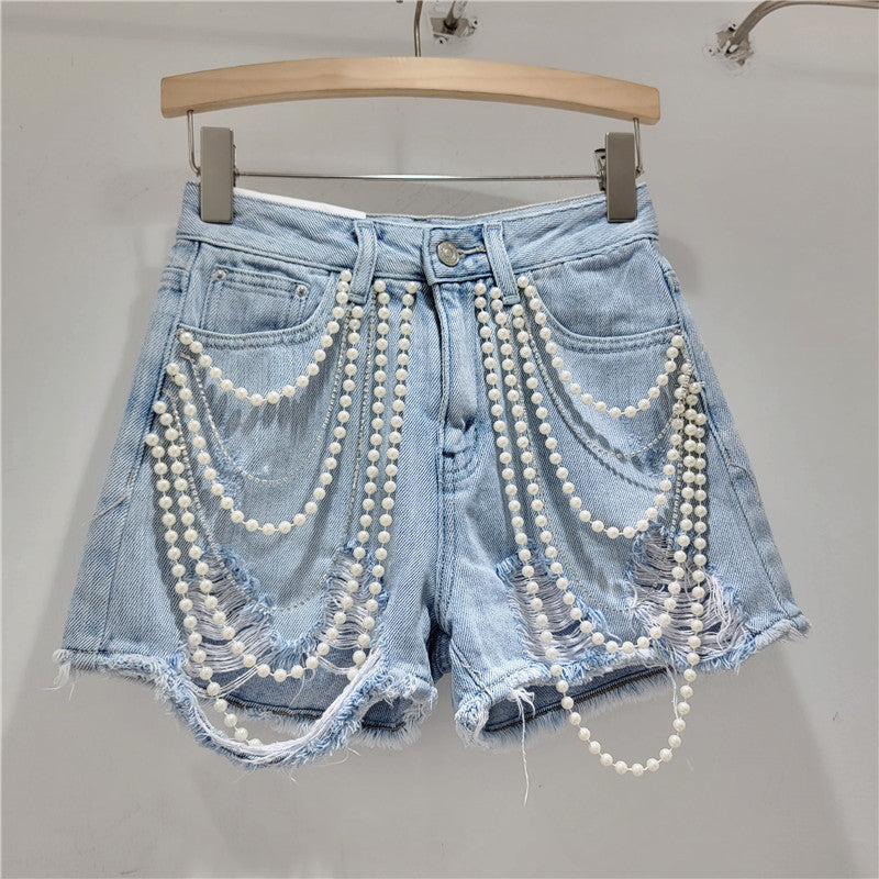 Short en jean perles