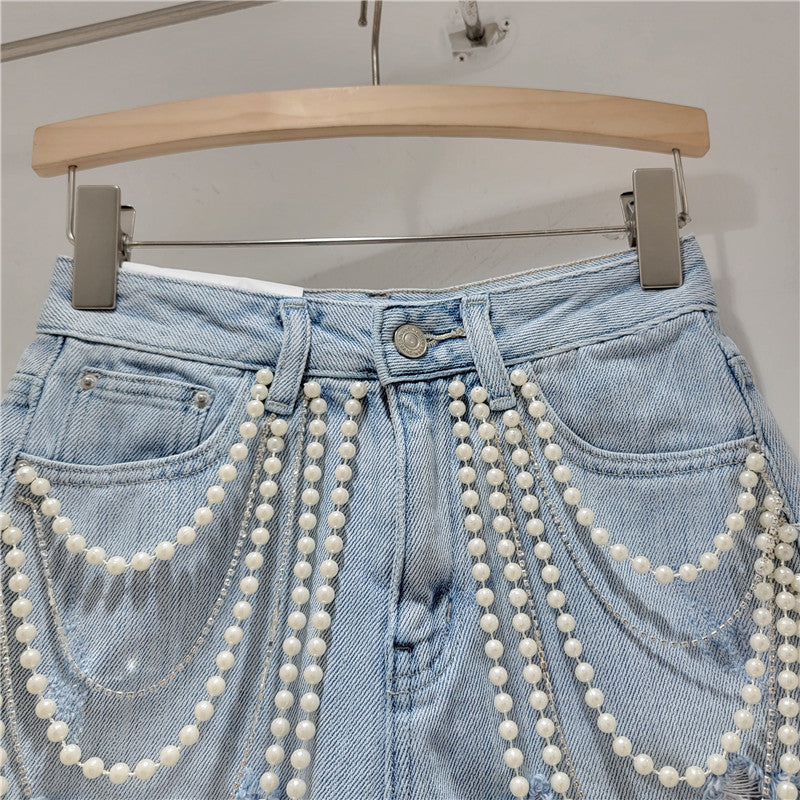 Short en jean perles