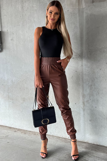 Pantalon skinny noir en simili cuir smocké