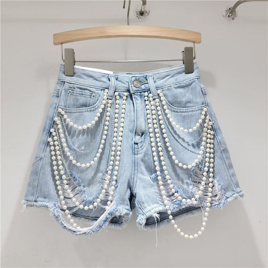 Short en jean perles