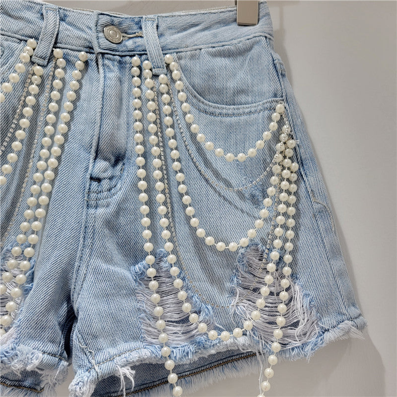 Short en jean perles