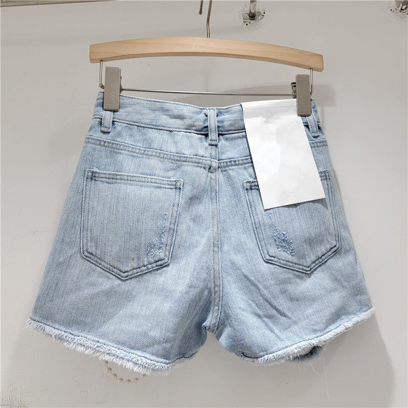 Short en jean perles