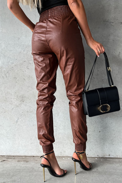 Pantalon skinny noir en simili cuir smocké
