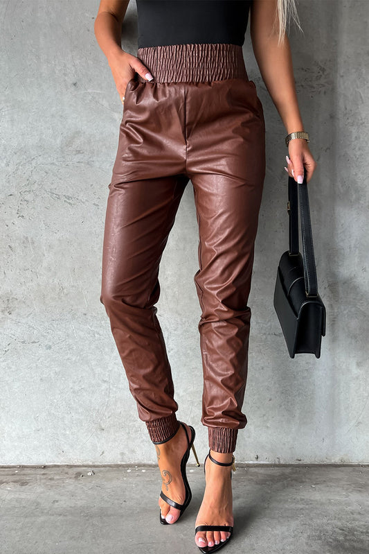 Pantalon skinny noir en simili cuir smocké