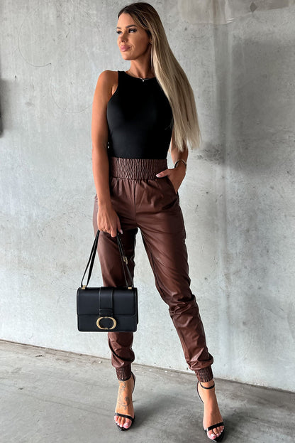 Pantalon skinny noir en simili cuir smocké